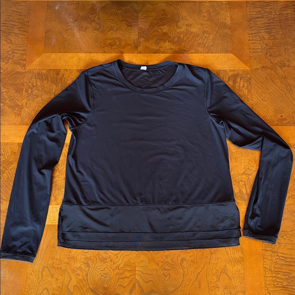 LULULEMON Black Long Sleeve Top with Ruffle Mesh Layer Hem size 4